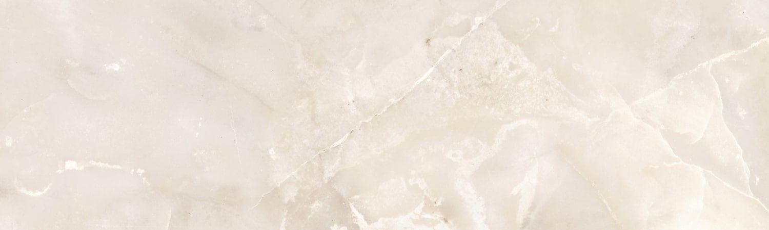 Textured black stone surface with subtle lines.