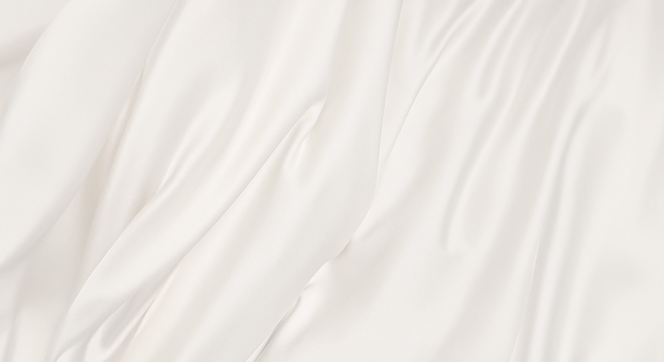 Elegant white satin fabric with gentle drapes.