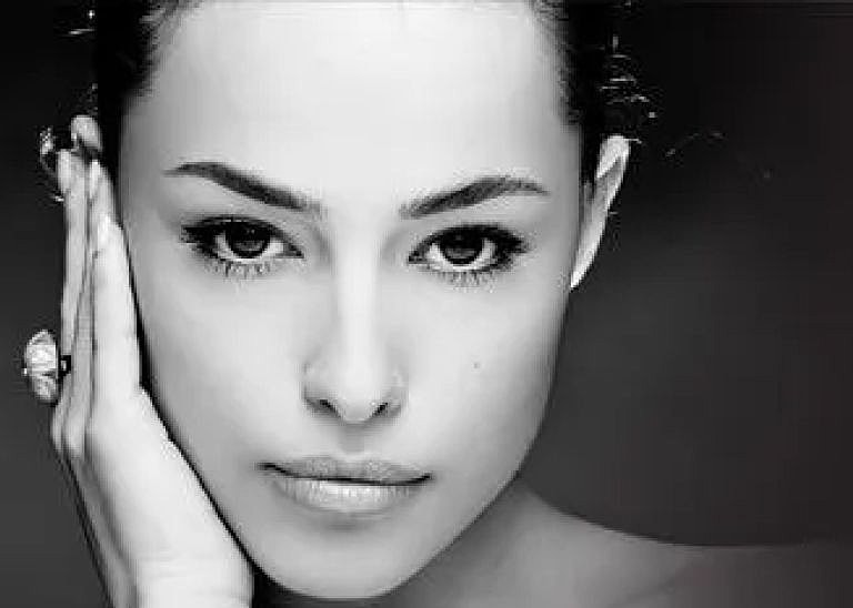 Black and white portrait of a woman.