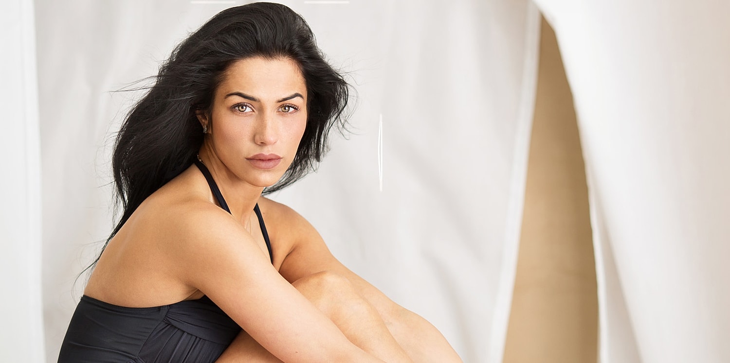 Houston Blepharoplasty model seated, looking directly at the camera.