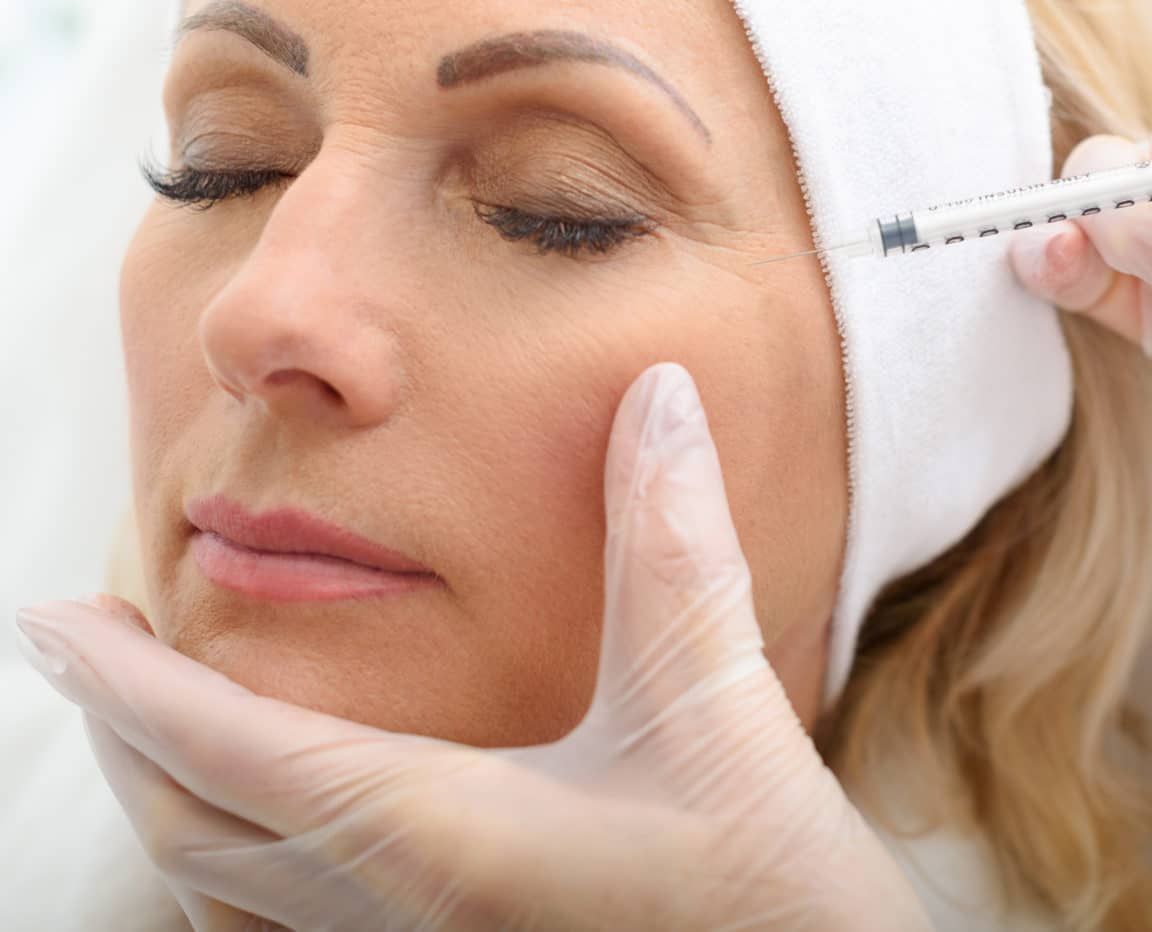 Senior Lady Having Botox Injecting Procedure