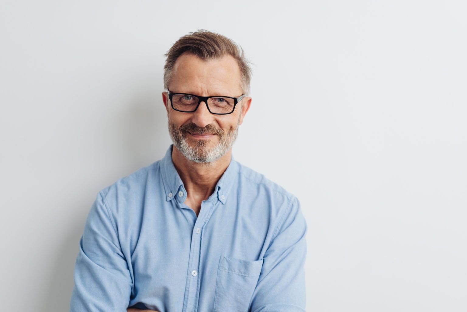 Bearded middle-aged man wearing glasses