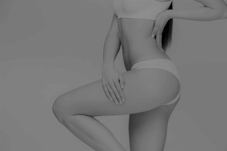 houston vaser liposuction model with long dark hair