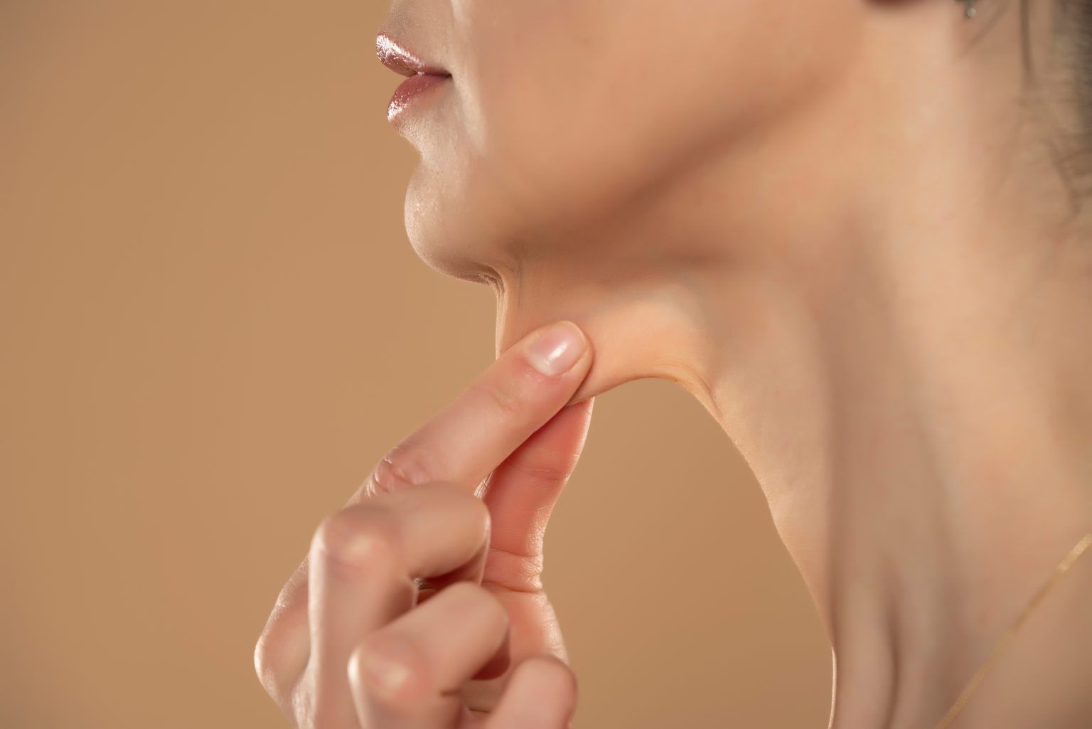 A Close-up And Side Profile View Of A Caucasian Lady